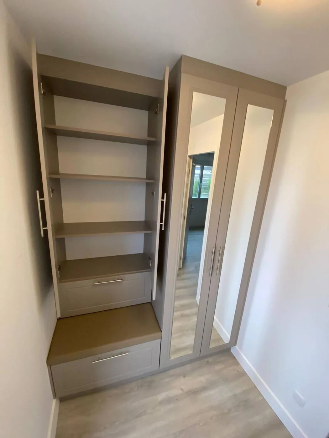 Bespoke wardrobe with mirrors and open storage