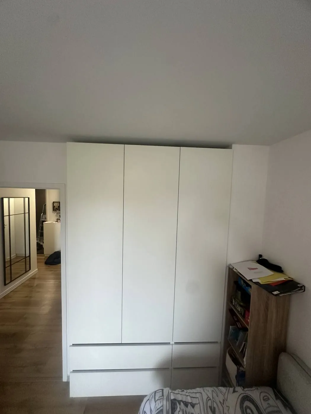 Bespoke three-door wardrobe with drawers