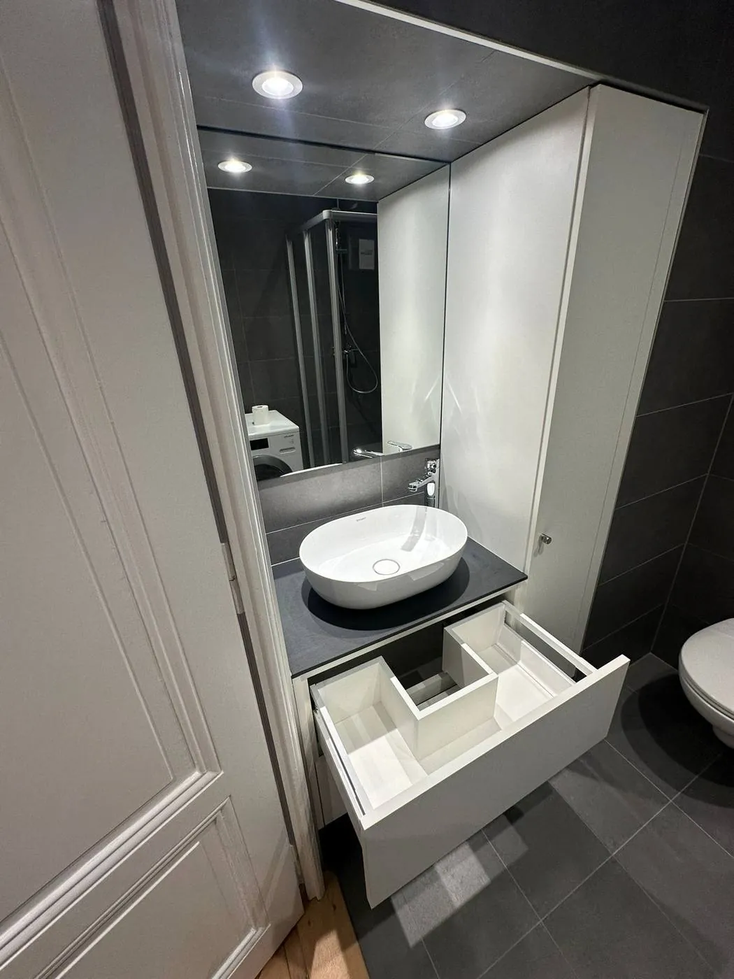 Wall-hung vanity unit with bespoke storage drawer